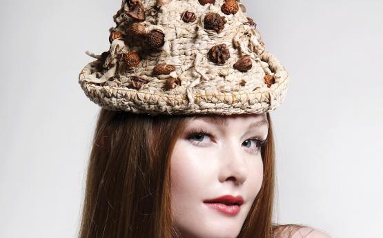 Twined Seed Hat Model: Sarah Pauley @ Viviens Model Management. Image copyright of WA Museum Photo by Penny Lane